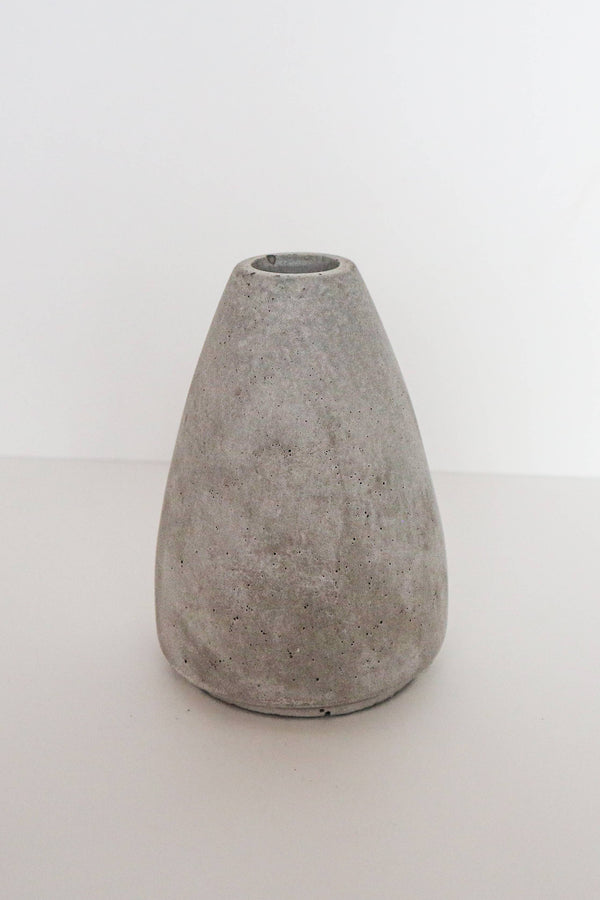 Concrete vase on a white background