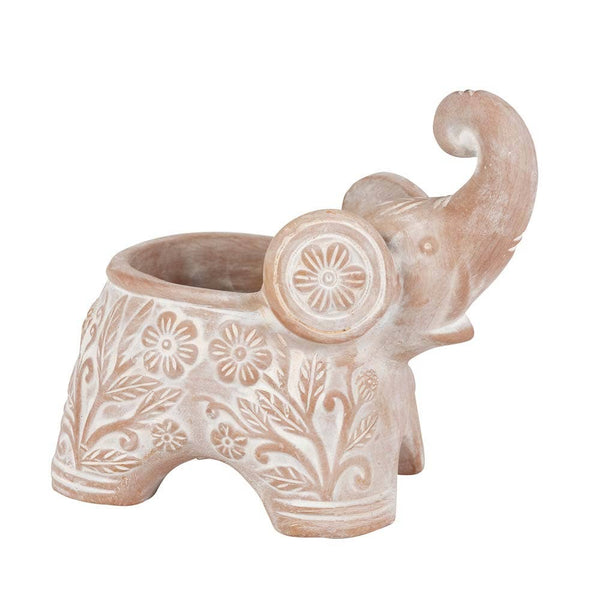 Terracotta elephant planter with floral patterns on a white background