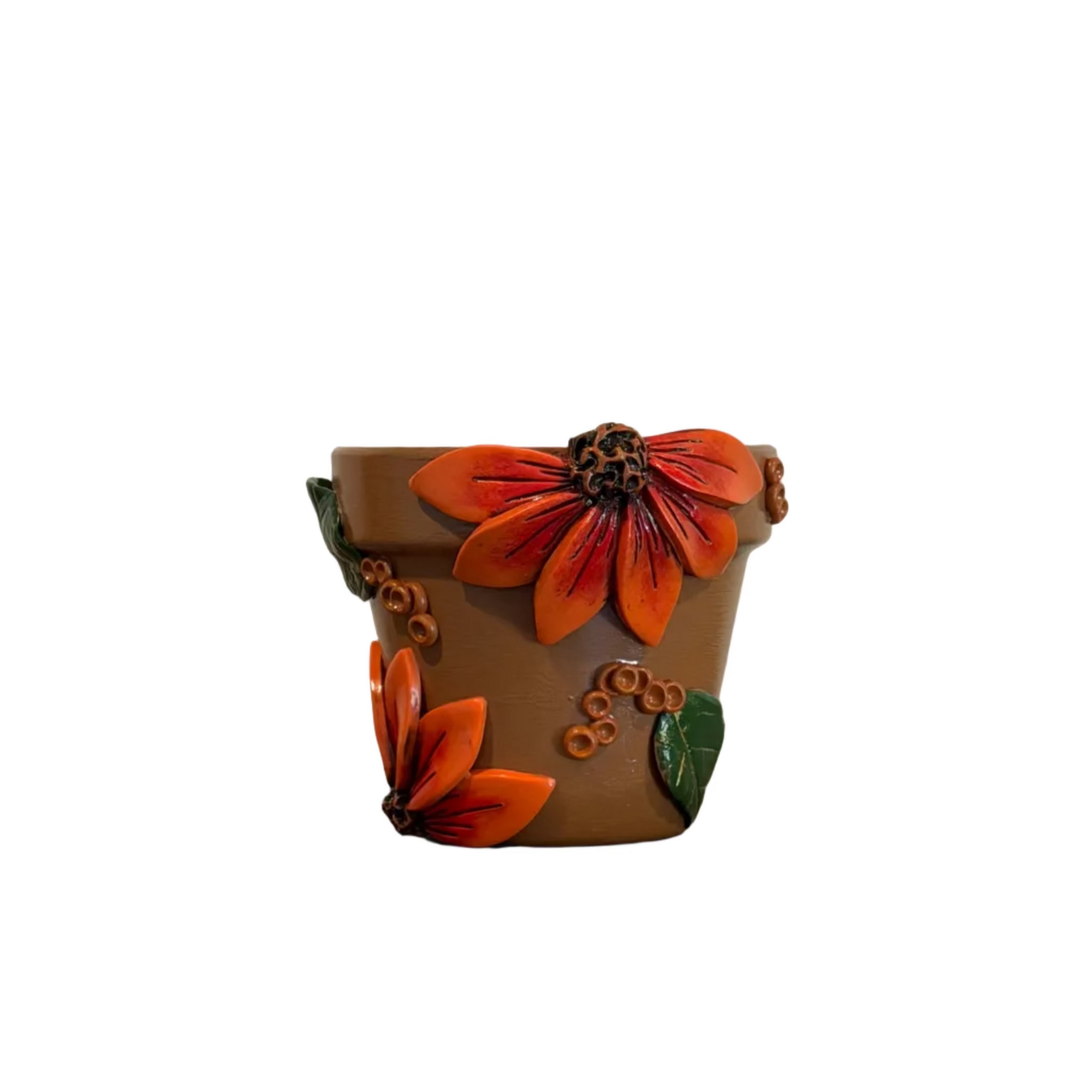 A small brown planter pot decorated with raised orange flowers, green leaves, and small orange berries