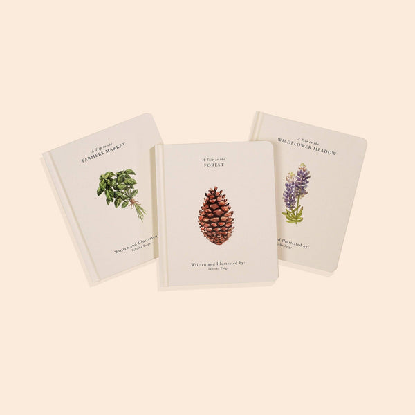Three books with nature-themed illustrations 