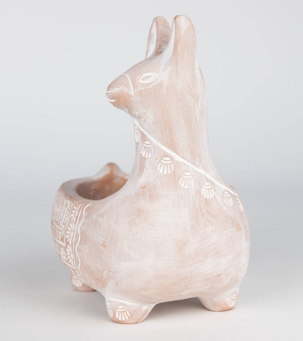 terracotta llama planter on a light gray background